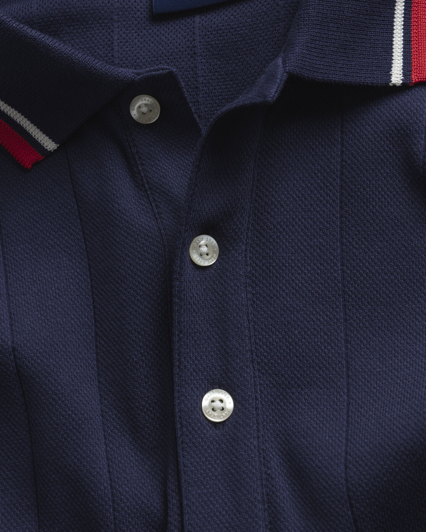 Rugger de manga corta y punto acanalado