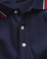 Rugger de manga corta y punto acanalado