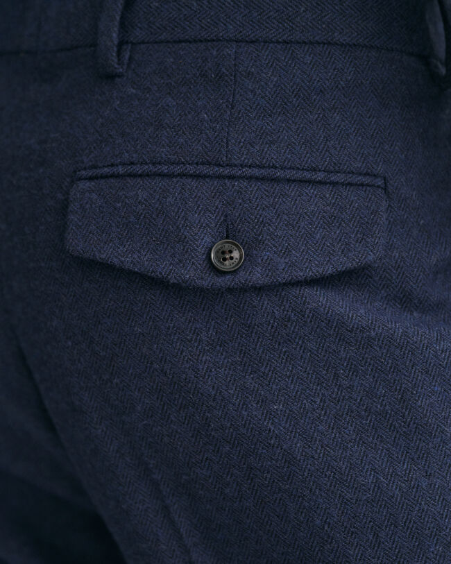 Pantalones con dise&ntilde;o de espiga ajustados en el bajo