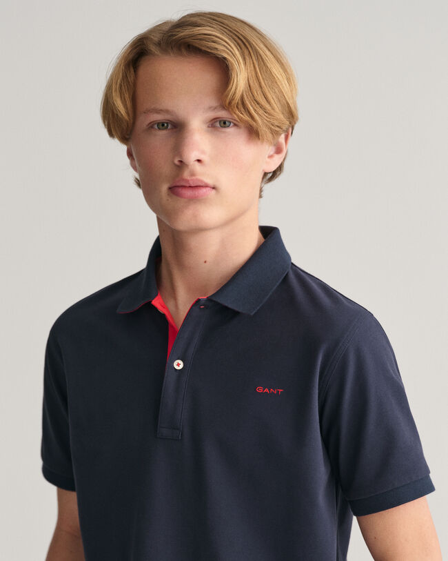 Polo de piqu&eacute; en contraste Teens