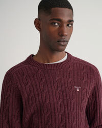 Jersey de cuello redondo y punto de ochos en lana de oveja