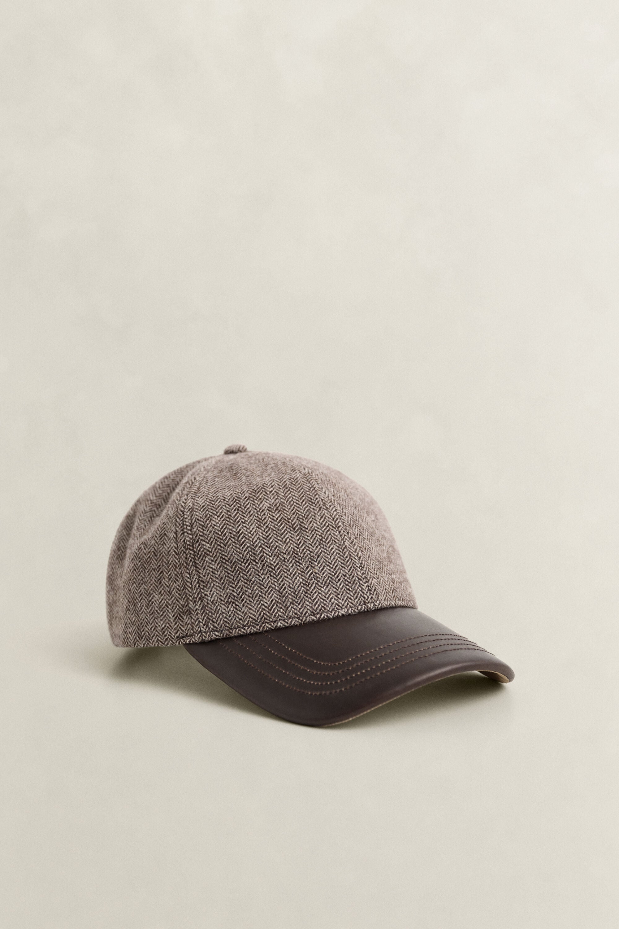 Gorra de mezcla de lana con visera de piel