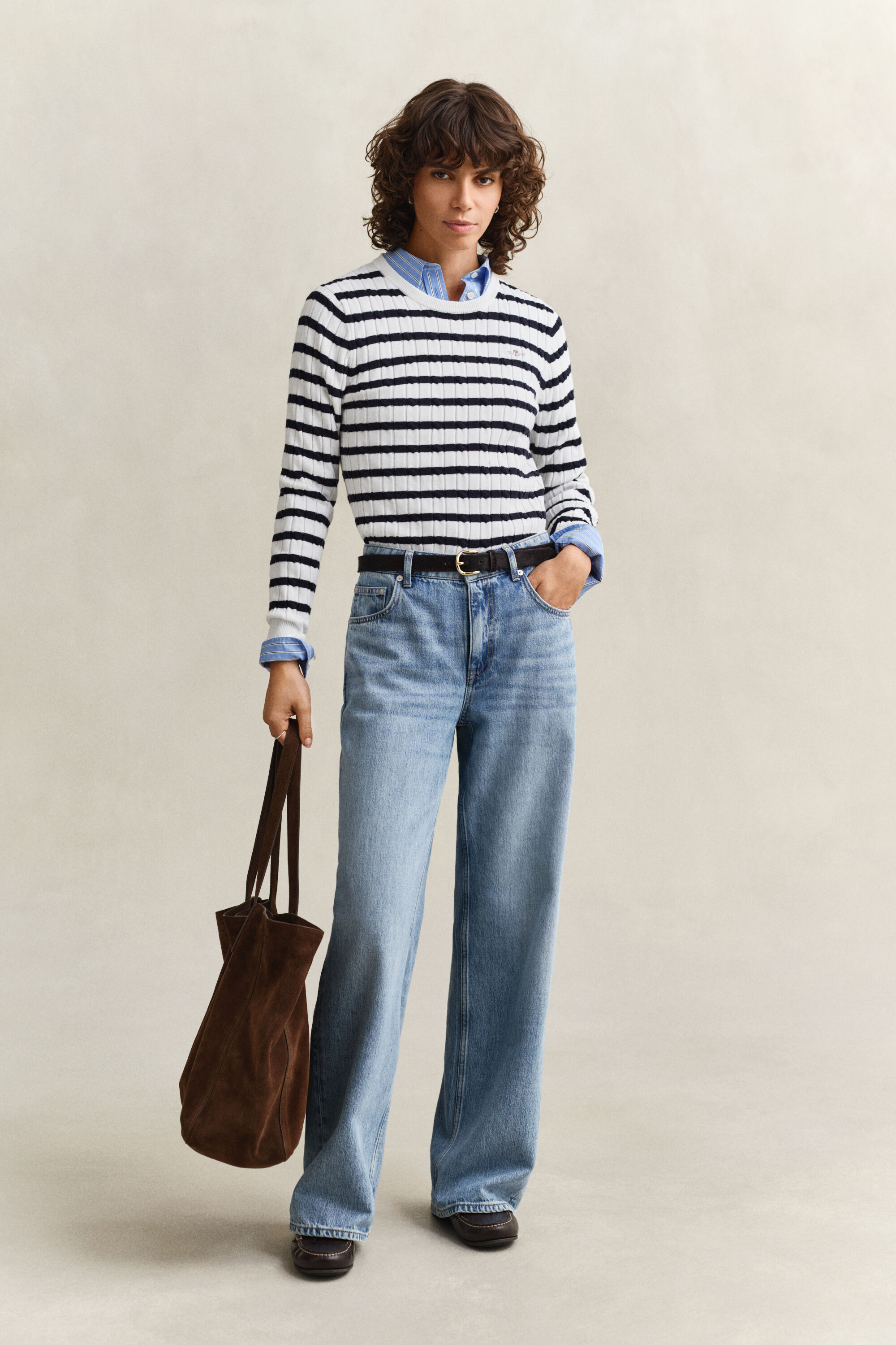Jersey de cuello redondo y punto de ochos a rayas