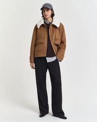 Jersey de cuello redondo y punto de ochos en lana de oveja