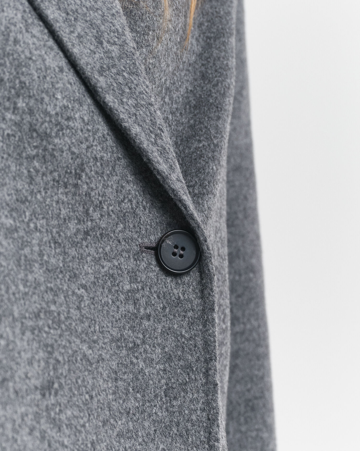 Chaqueta cosida a mano con cinturón