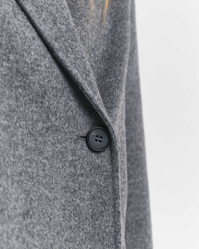 Chaqueta cosida a mano con cinturón