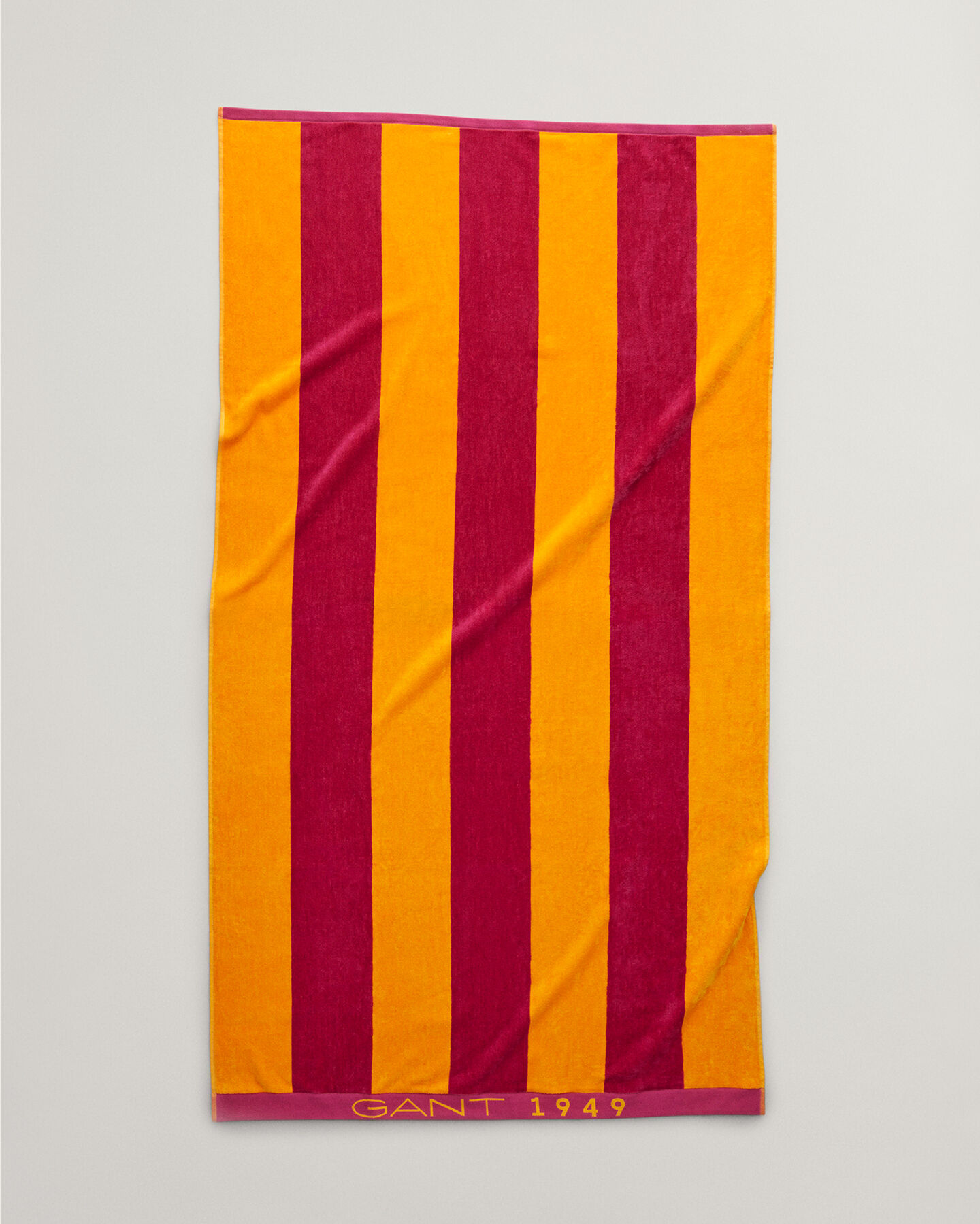 Toalla de playa de rayas gruesas