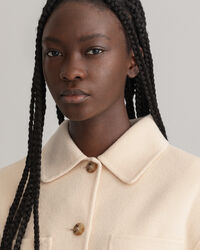 Sobrecamisa cosida a mano