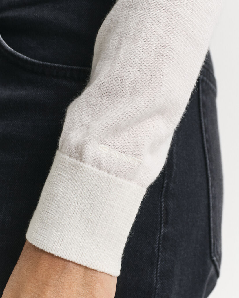 Jersey de lana merino extrafina con cuello de pico