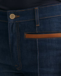 Vaqueros Slim Fit con detalle de piel