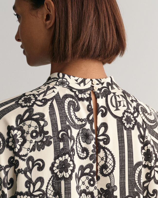 Blusa de cuello de cisne con estampado de encaje