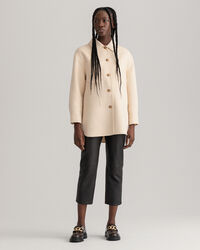 Sobrecamisa cosida a mano