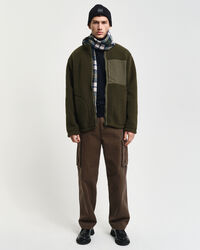 Forro polar reversible con cremallera