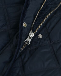 Abrigo acolchado con ribete de pana