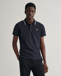 Polo de piqu&eacute; con cuello a rayas en contraste