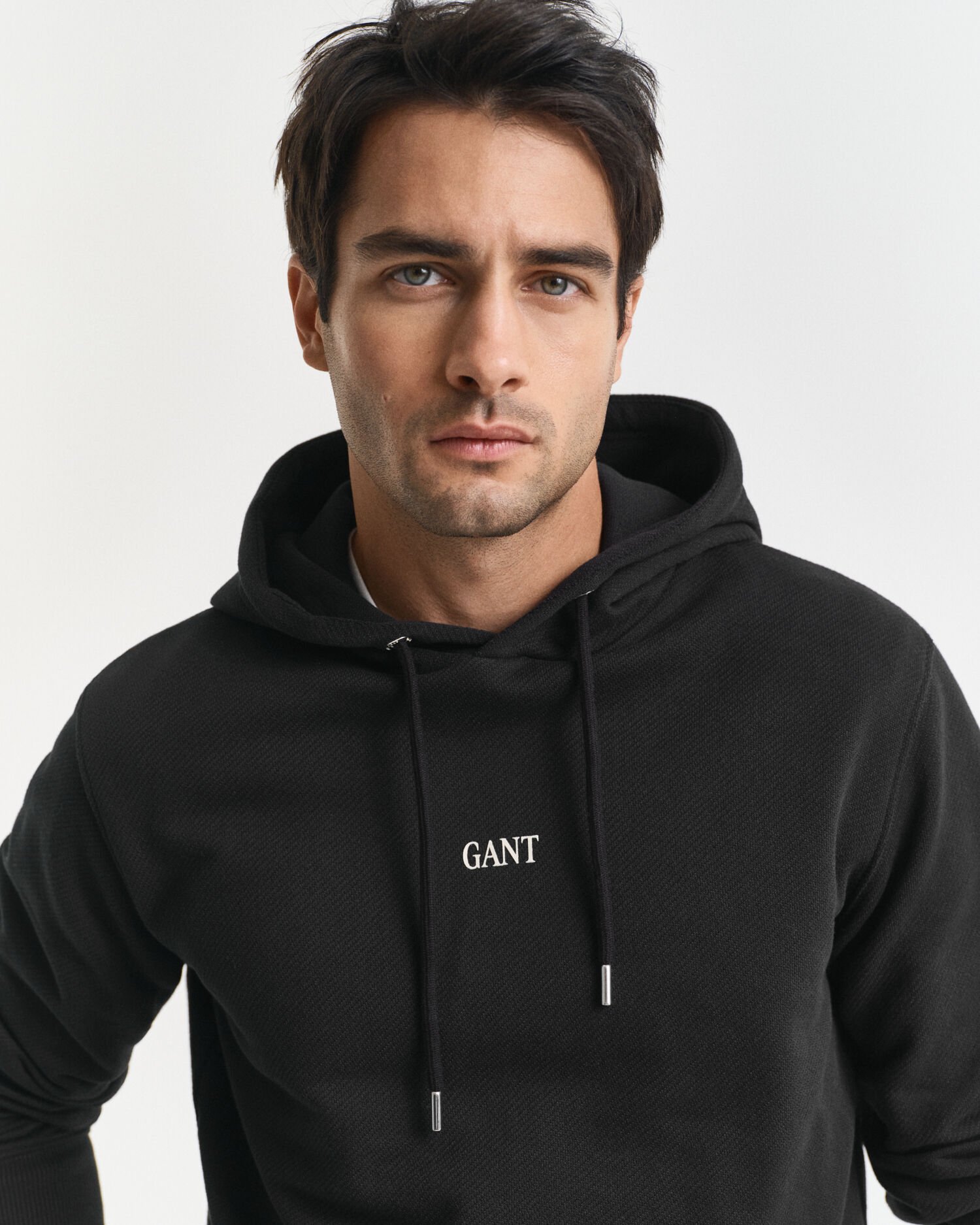 Sudadera con capucha y diseño de pequeñas dimensiones