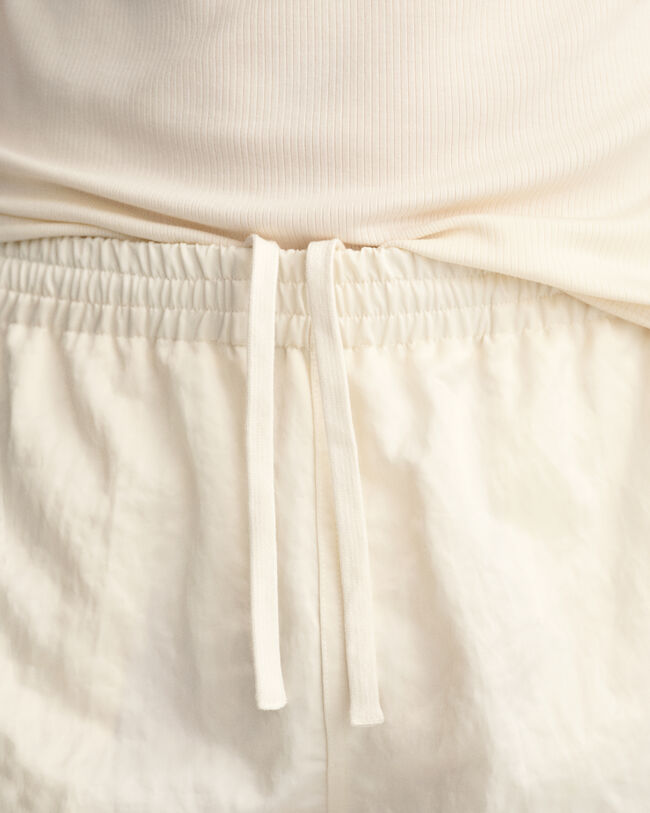 Pantalones cortos de running en satén