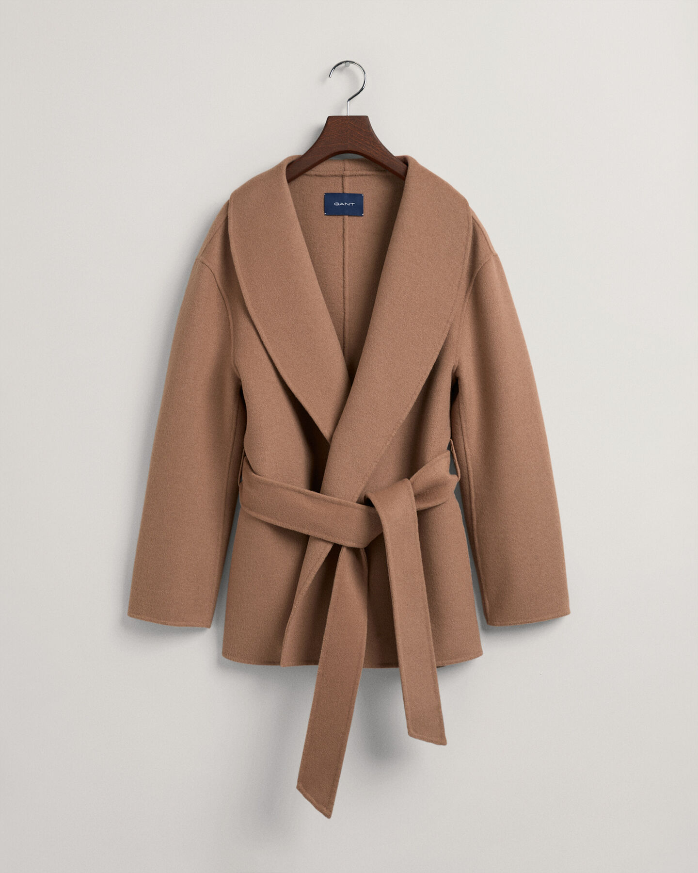 Americana cosida a mano con cinturón