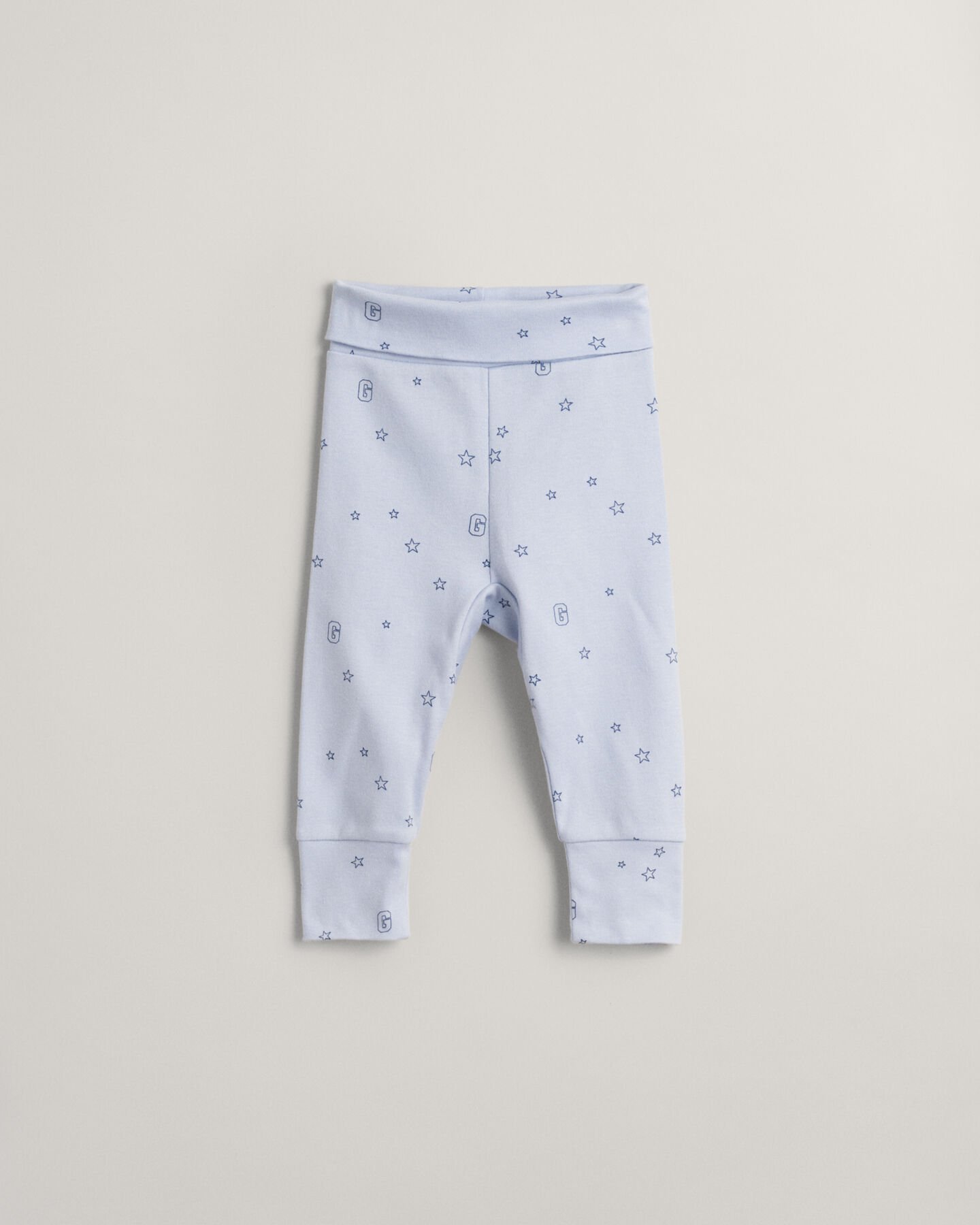 Leggings con estampado de estrellas y G Baby