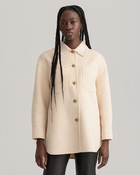 Sobrecamisa cosida a mano