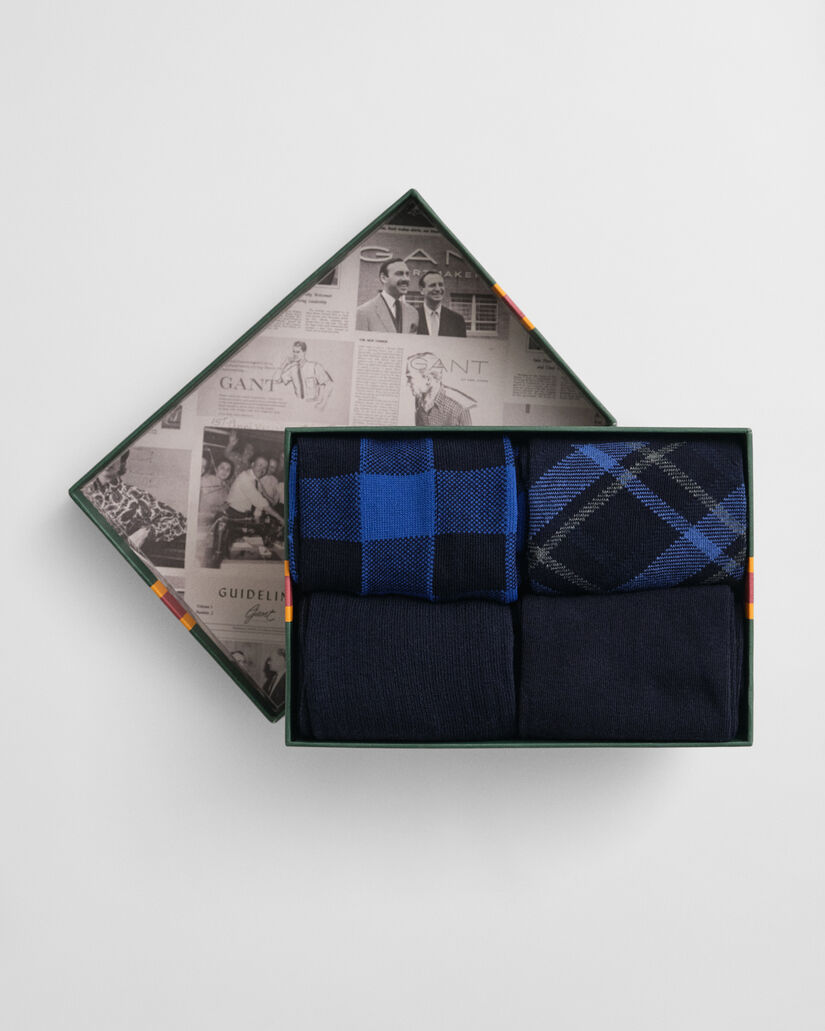 Caja de regalo con cuatro pares de calcetines a cuadros y lisos