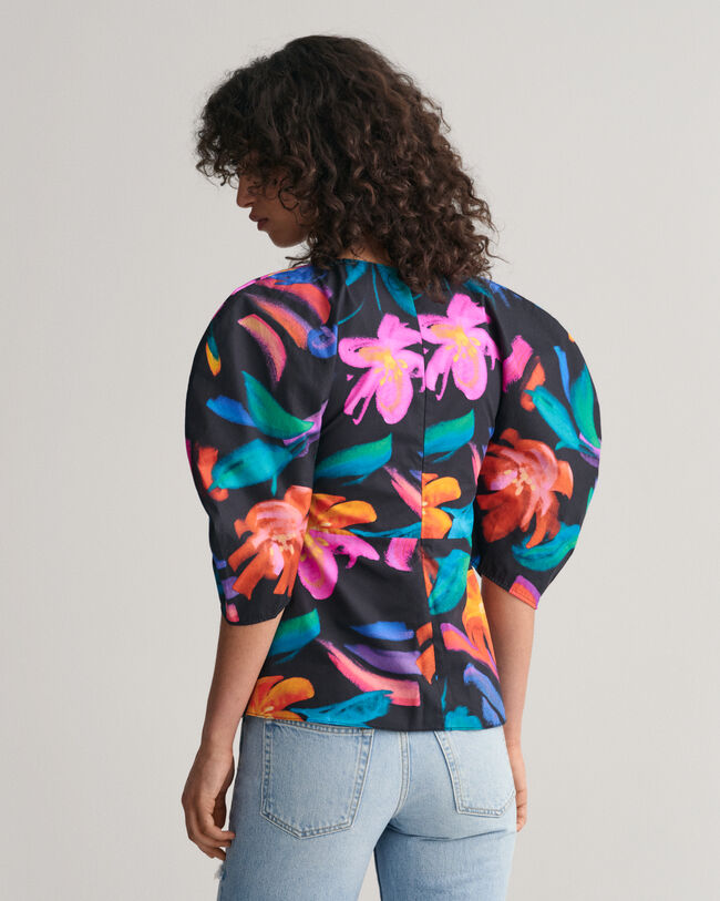 Blusa con mangas volumen y estampado de flores