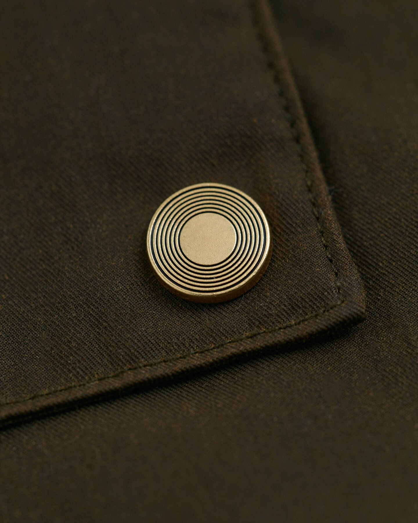 Chaqueta encerada de largo medio