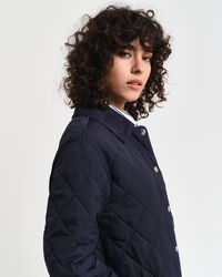 Abrigo acolchado con detalles de pana