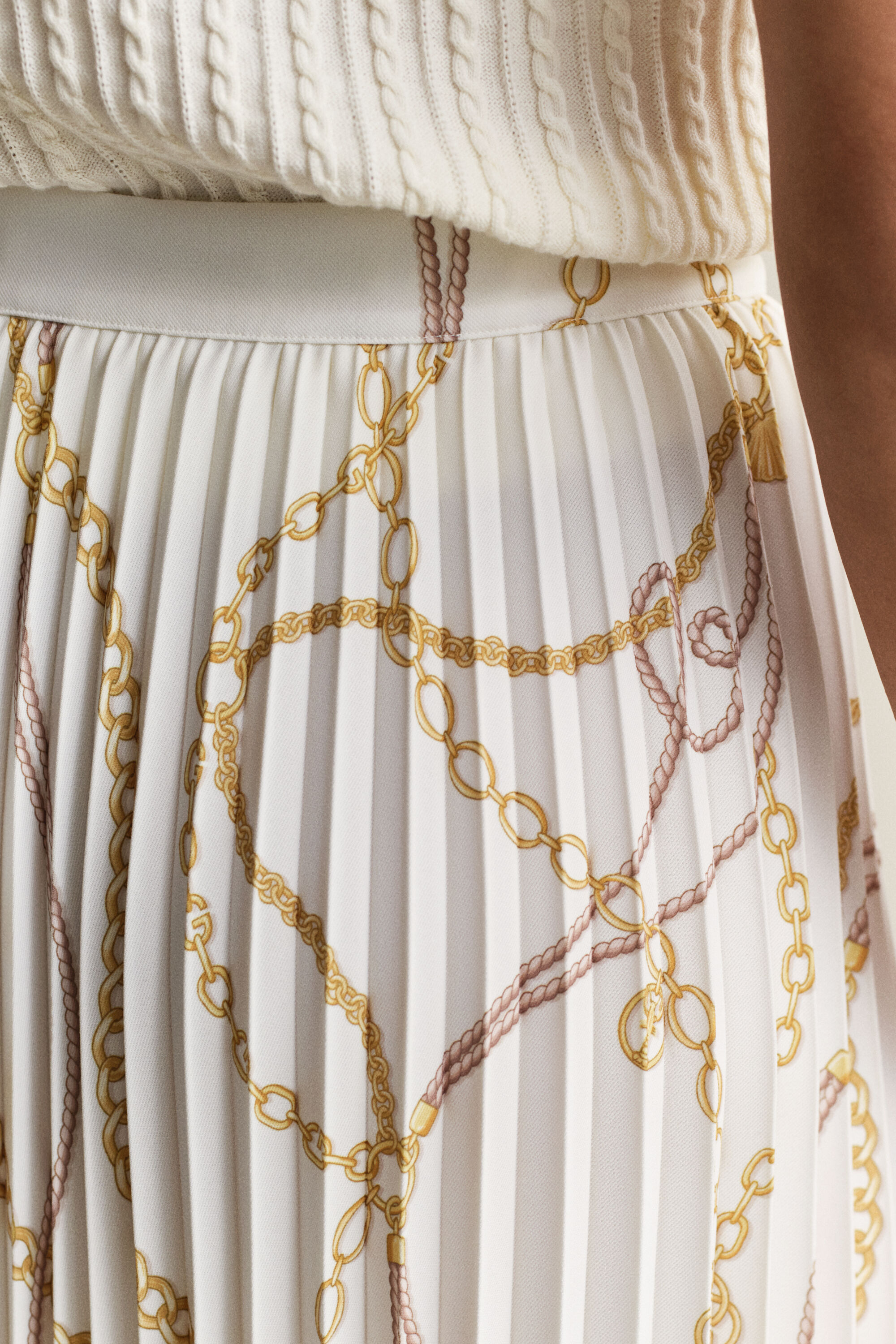 Falda midi plisada y estampada