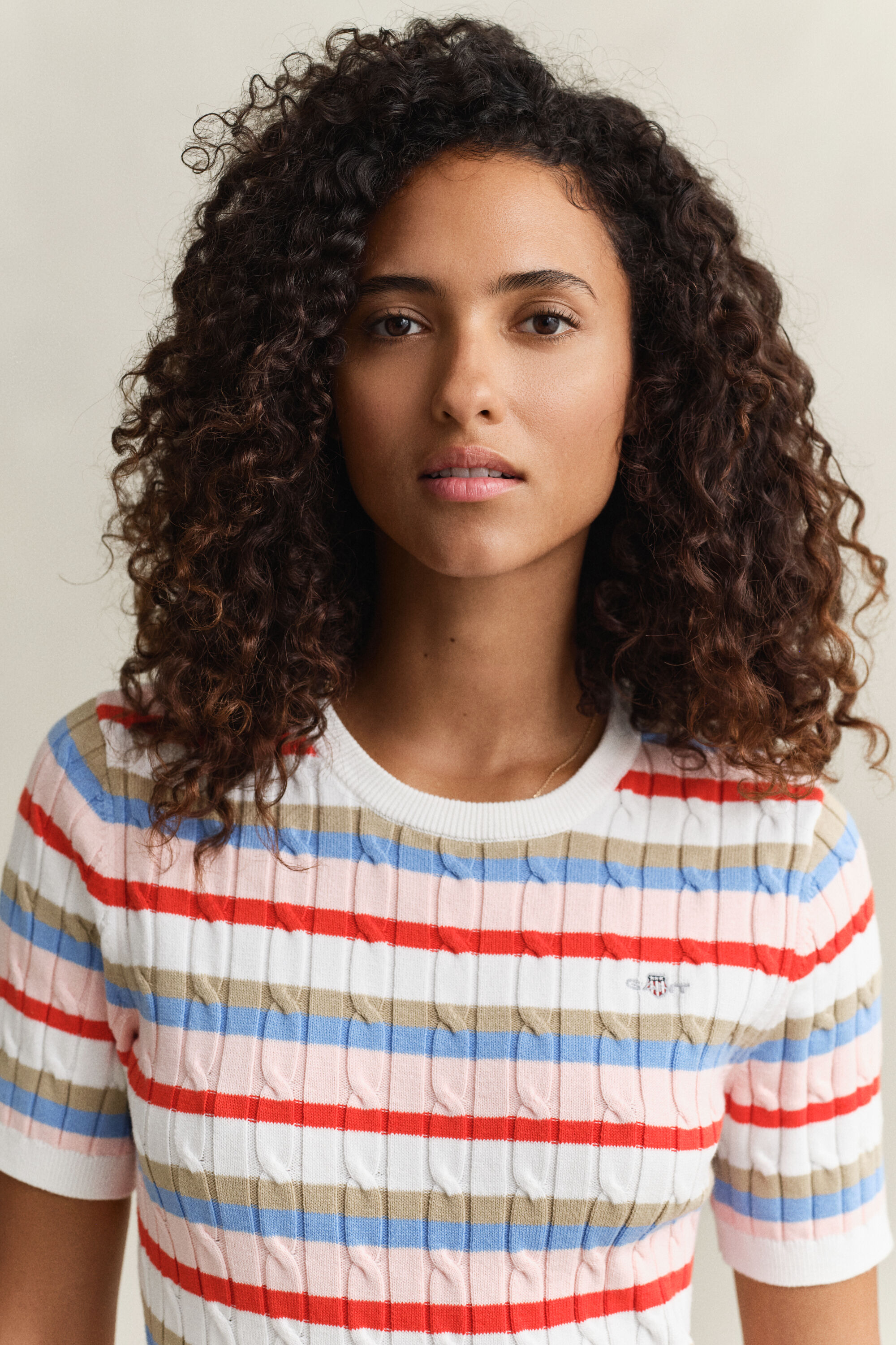 Jersey de punto de ochos a rayas y manga corta