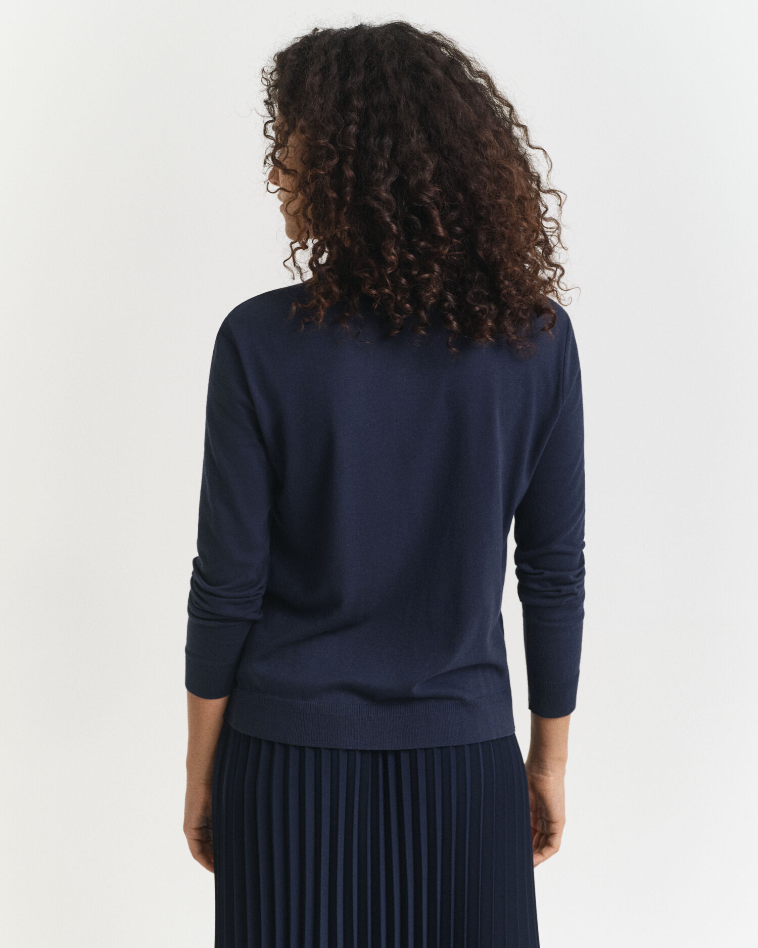 Polo de manga larga abotonado y sin costuras