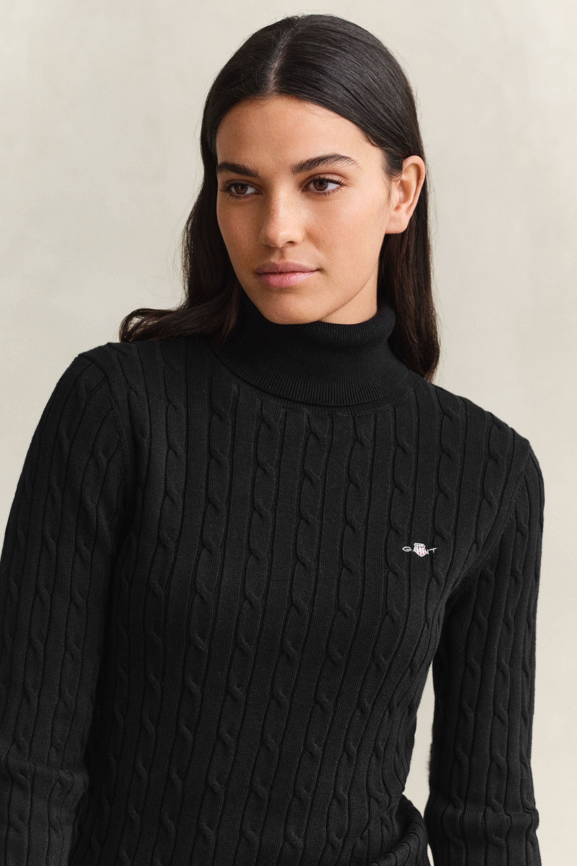 Jersey de punto de ochos con cuello de cisne en algodón elástico