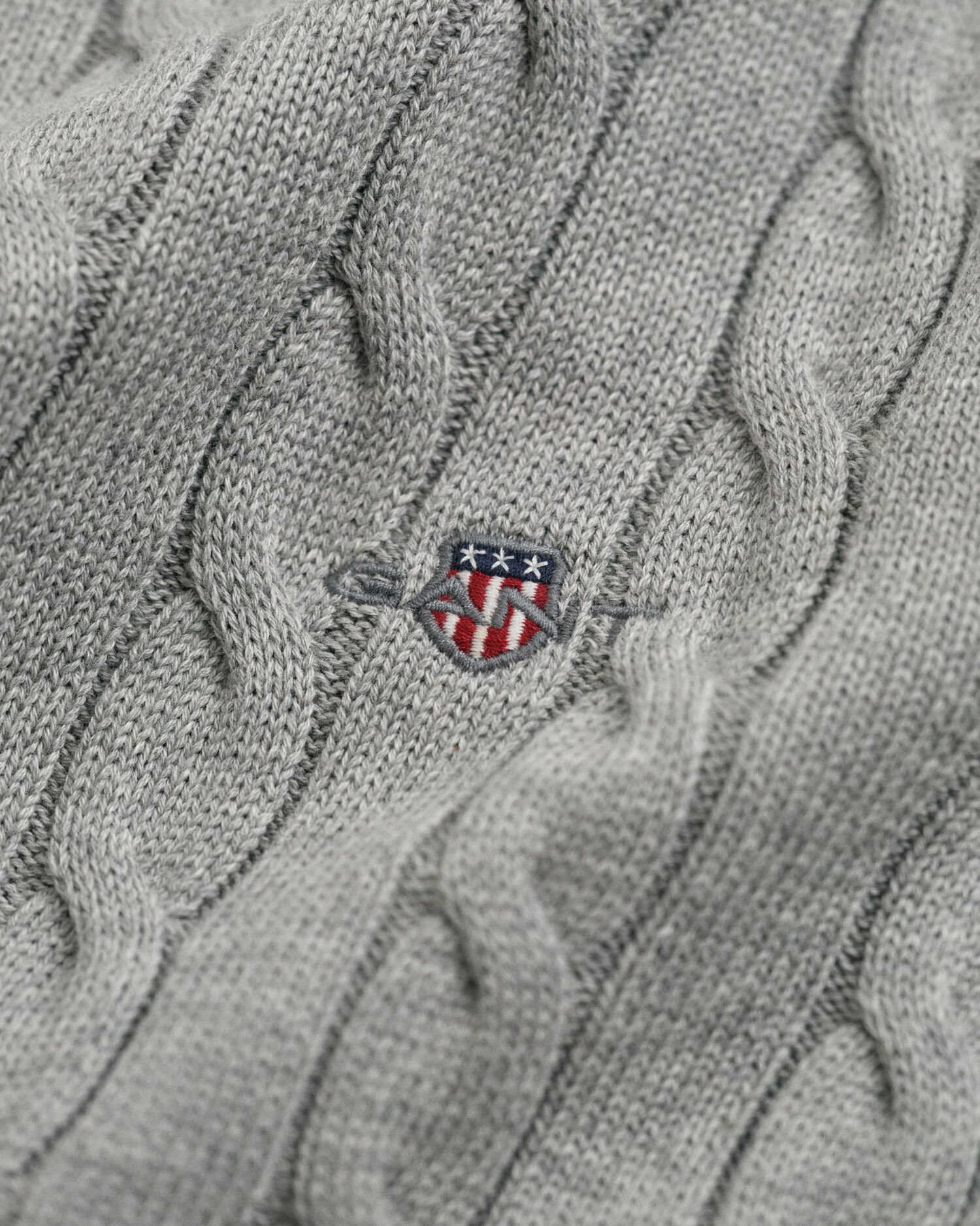 Jersey de punto de ochos de algodón con cuello de cisne