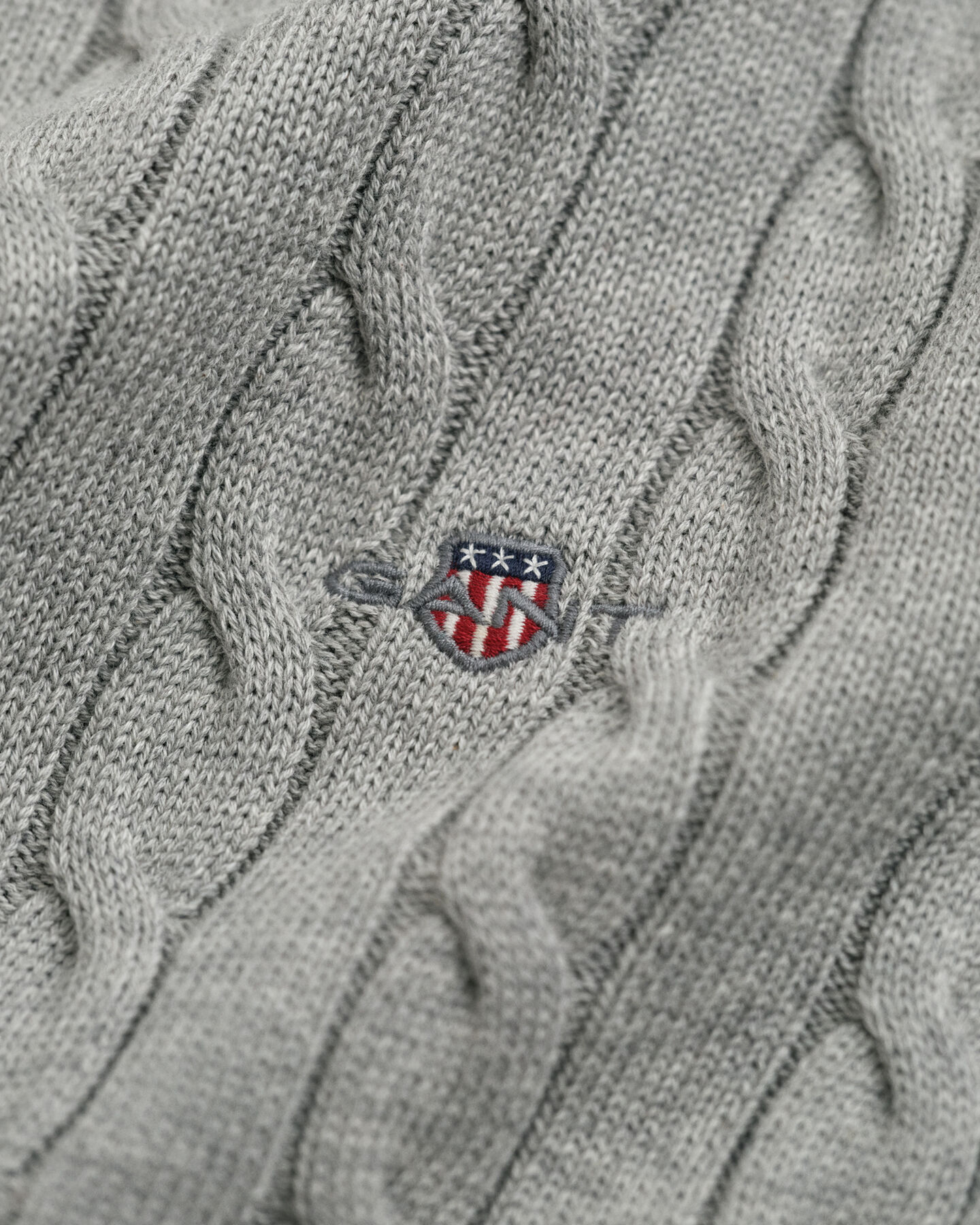 Jersey de punto de ochos de algodón con cuello de cisne