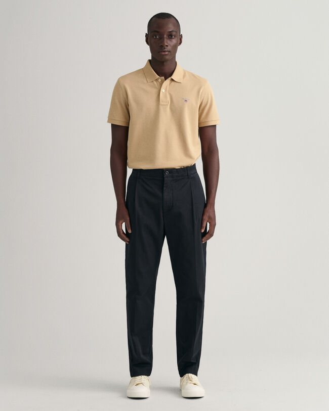 Pantalones de pinzas ajustados en el bajo