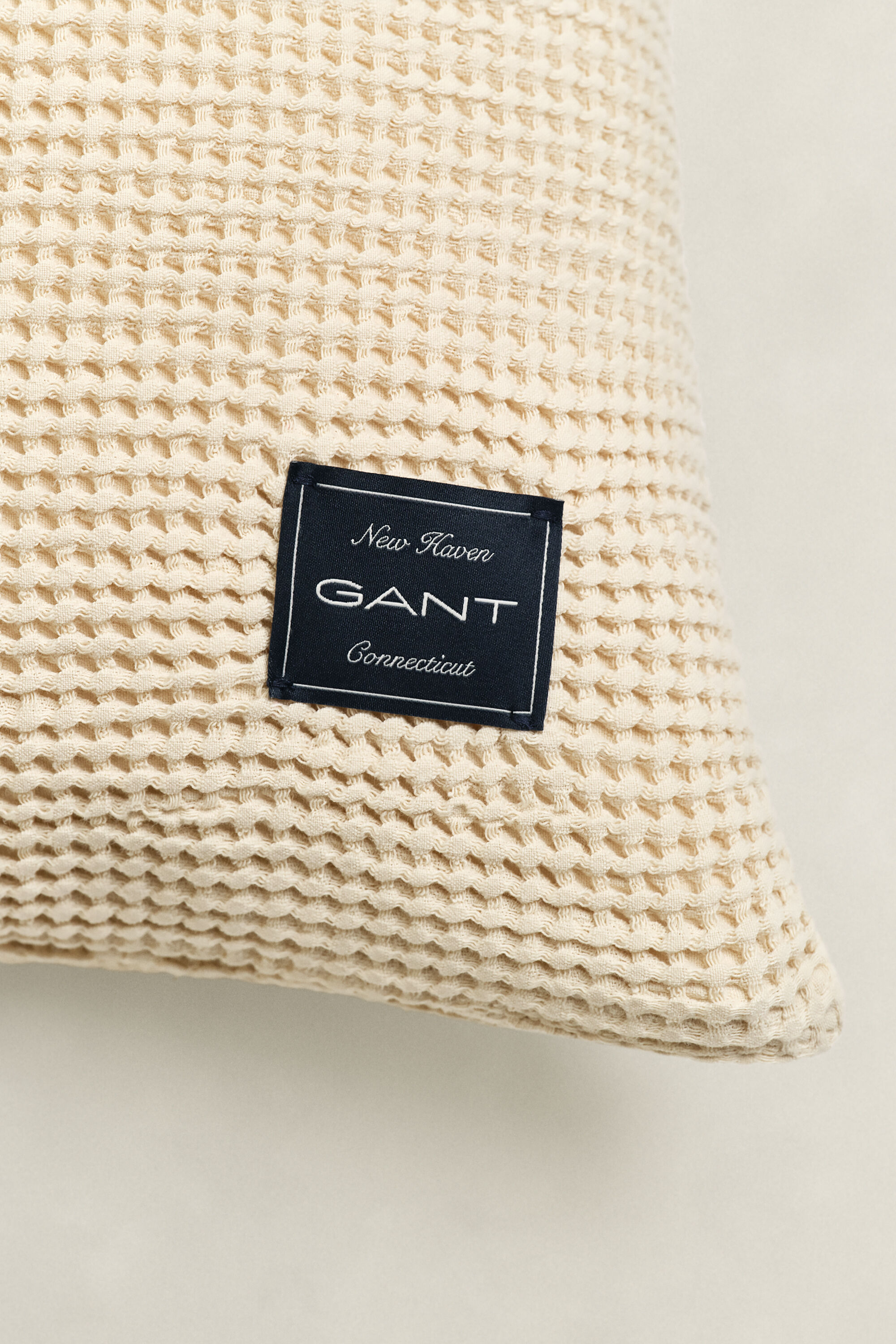 Cojín de algodón con textura de nido de abeja