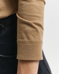 Polo de manga larga abotonado y sin costuras