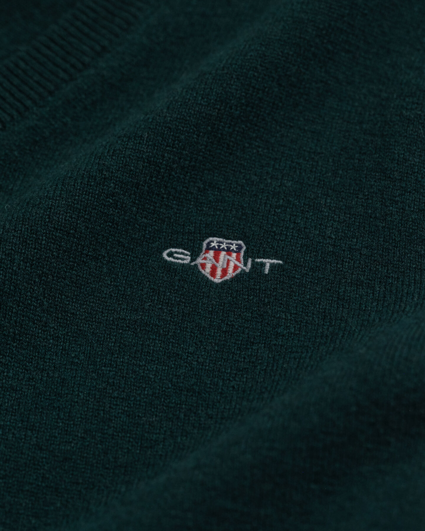 Jersey de cuello de pico en lana de oveja muy fina