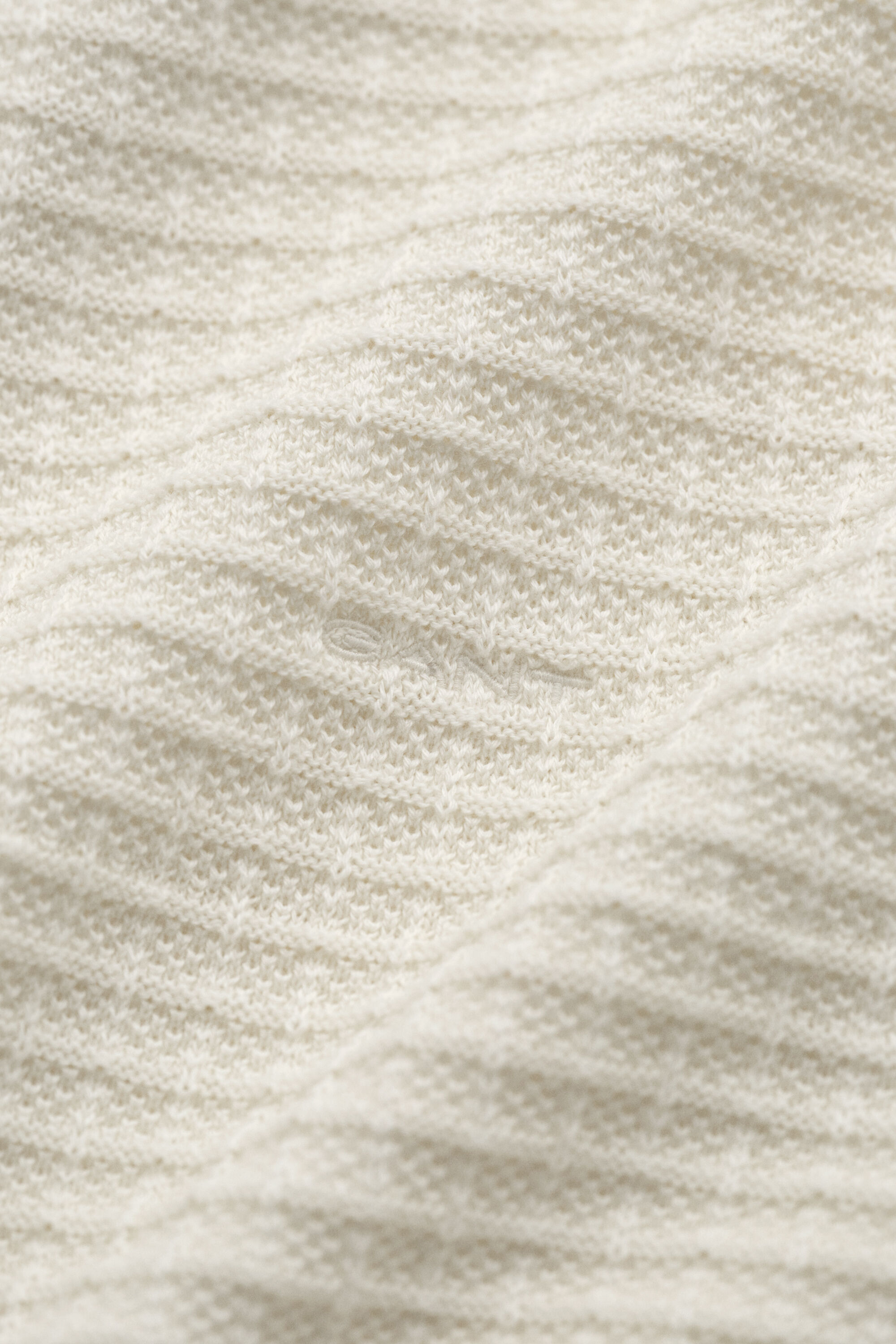 Jersey con media cremallera y textura