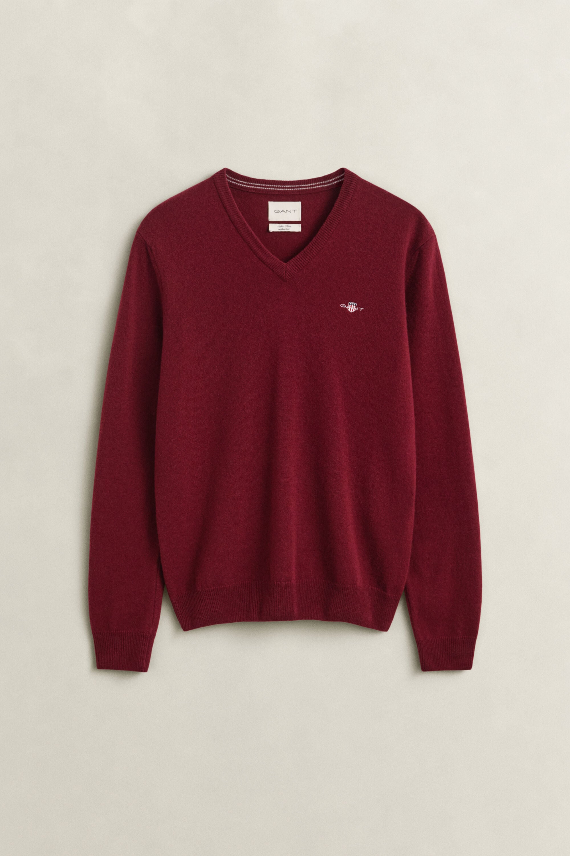 Jersey de cuello de pico en lana de oveja