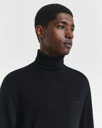 Jersey de lana merino extrafina con cuello de cisne