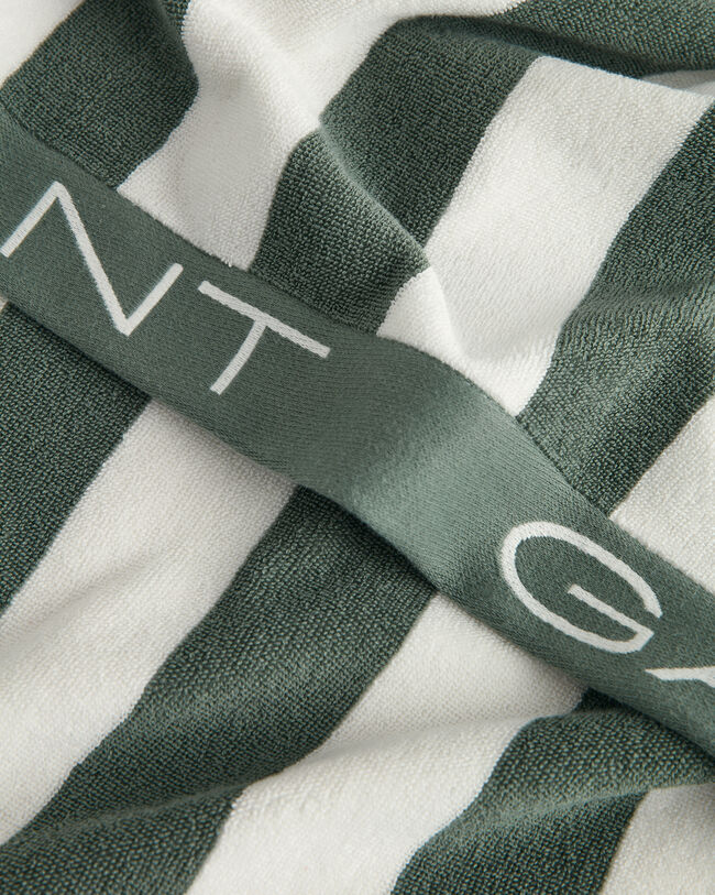 Toalla de playa de rayas en bloque