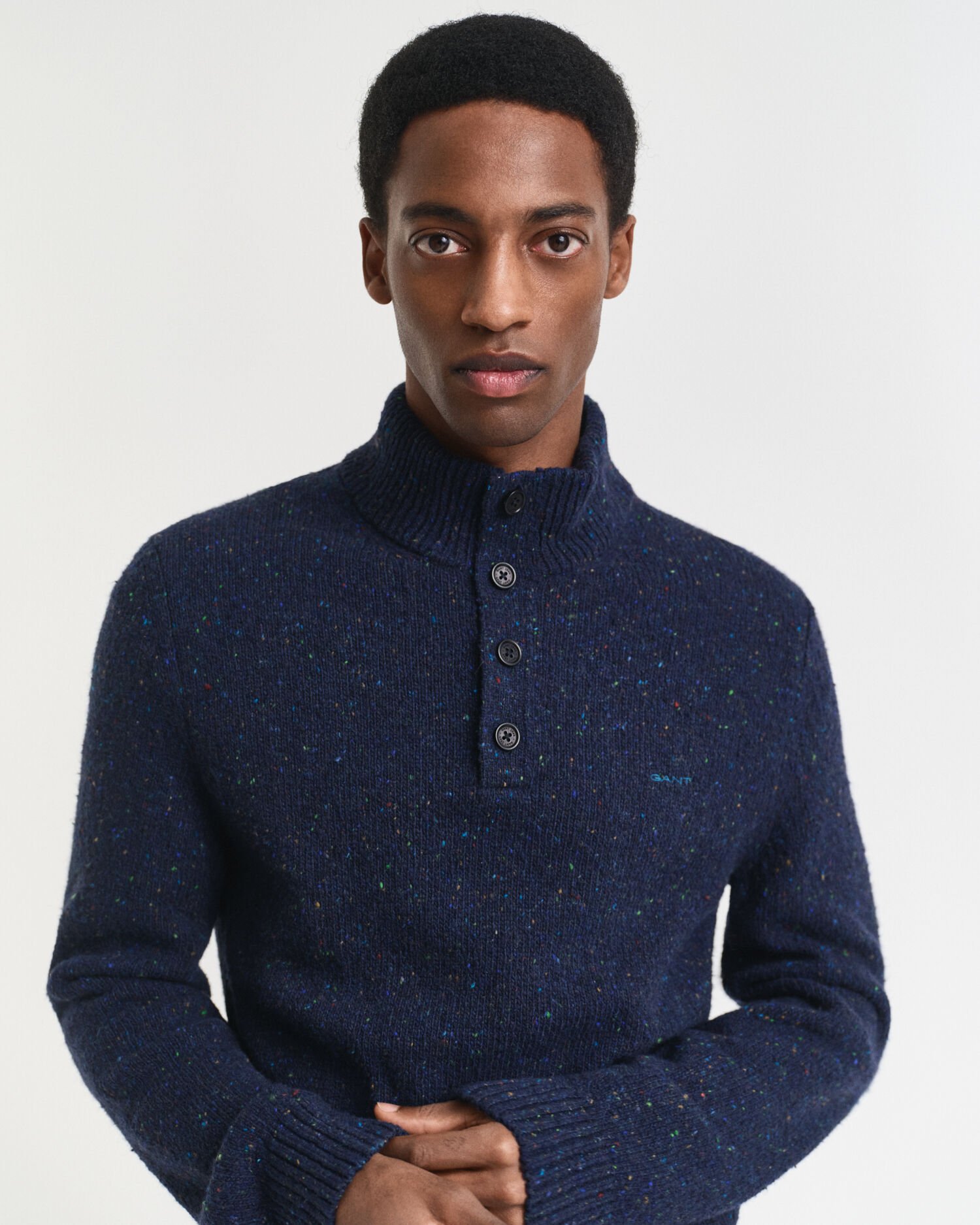 Jersey con media botonadura en mezcla de lana con nepps