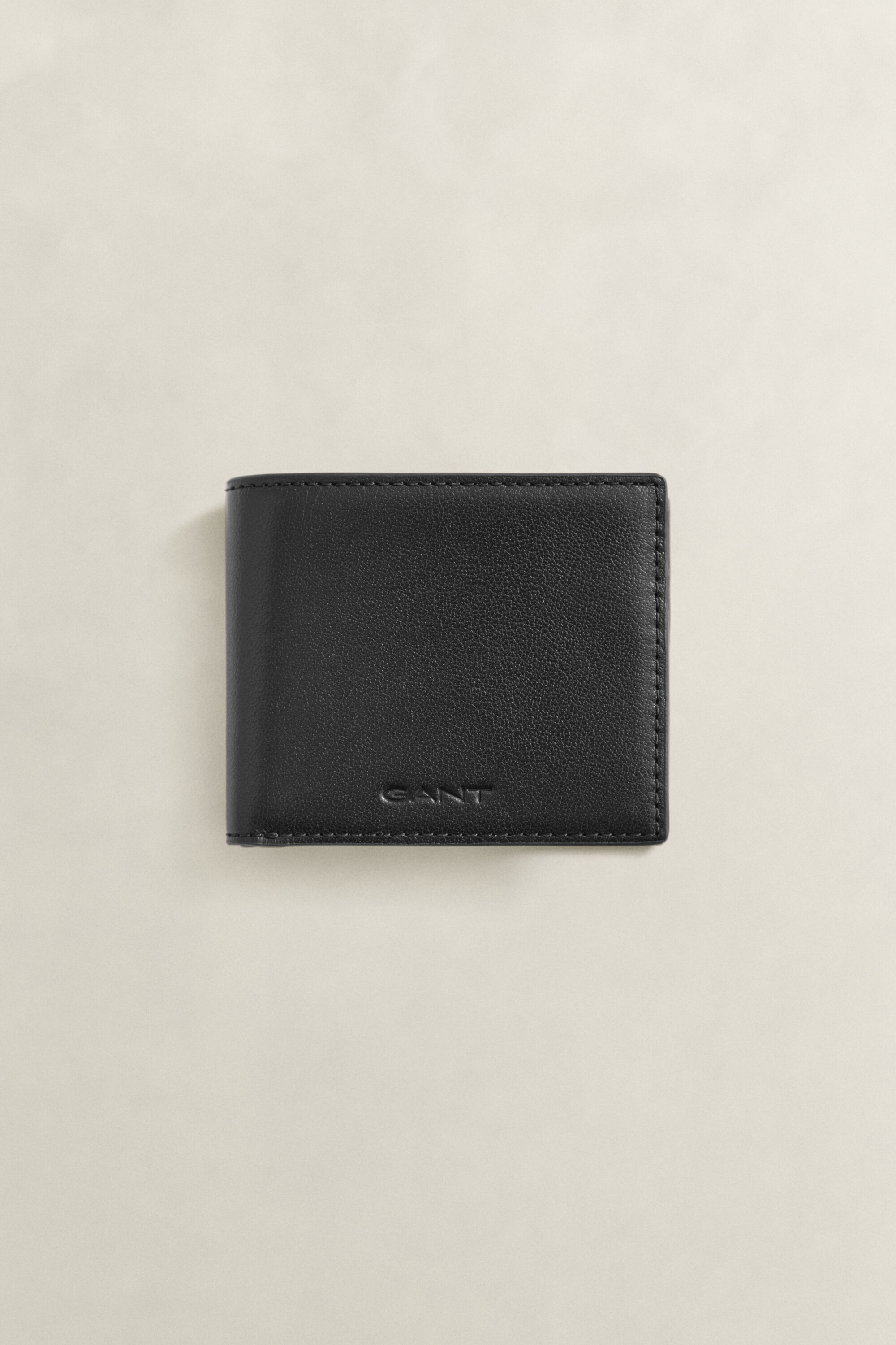 Cartera plegable de piel