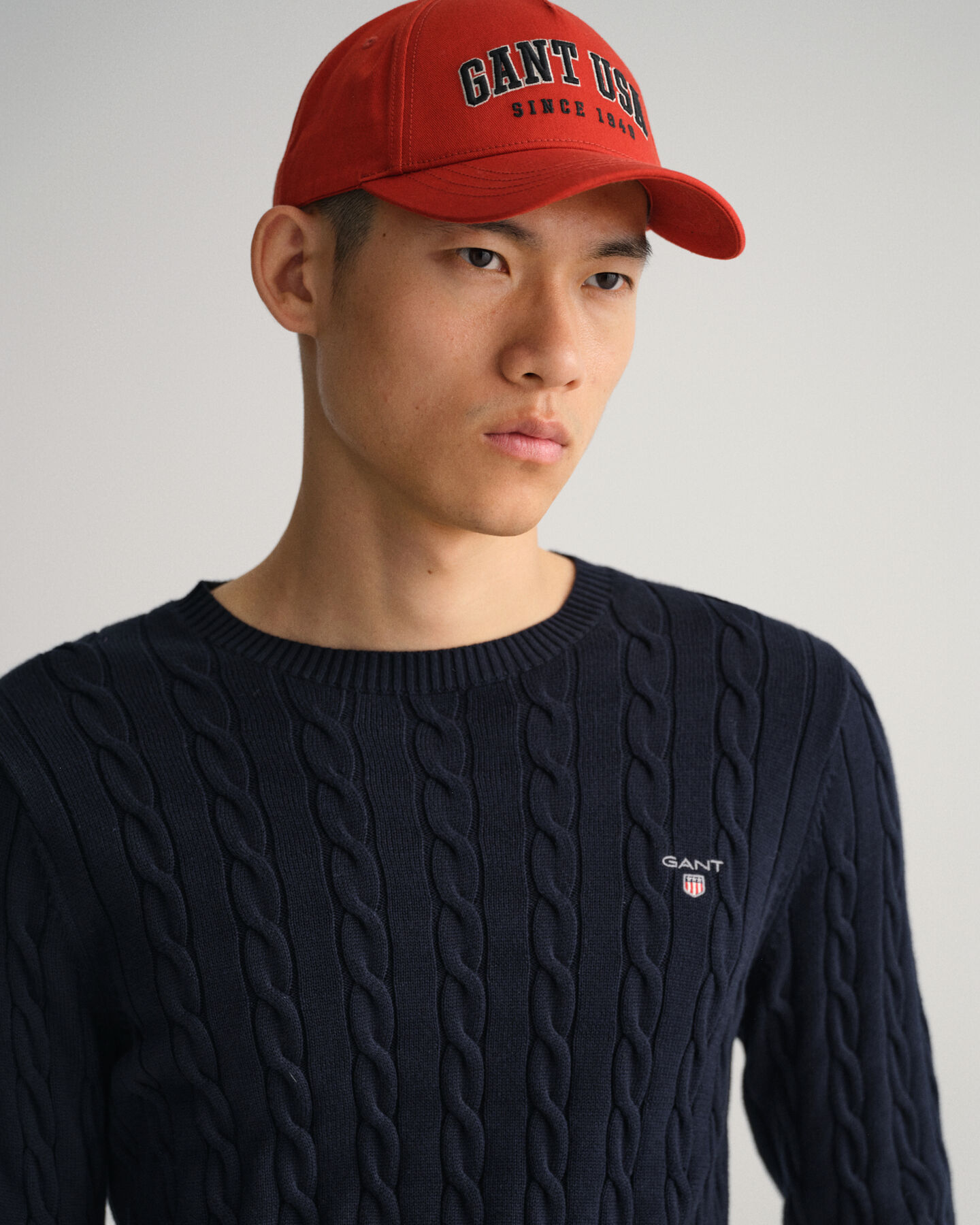 Jersey de cuello redondo y punto de ochos en algodón