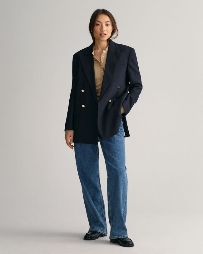 Polo de manga larga con cuello y detalle