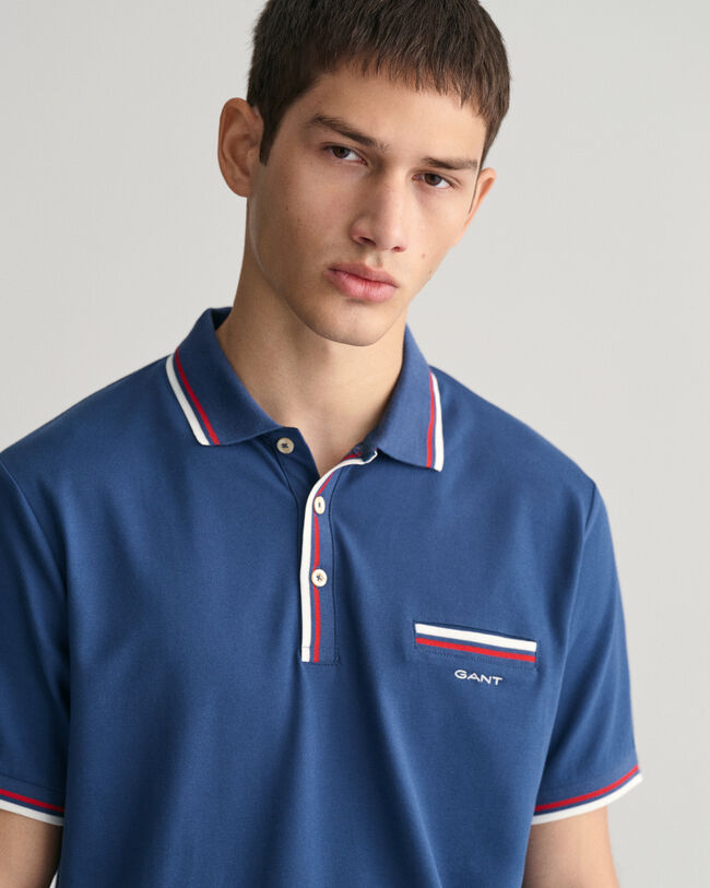 Polo de piqu&eacute; con ribete en dos colores