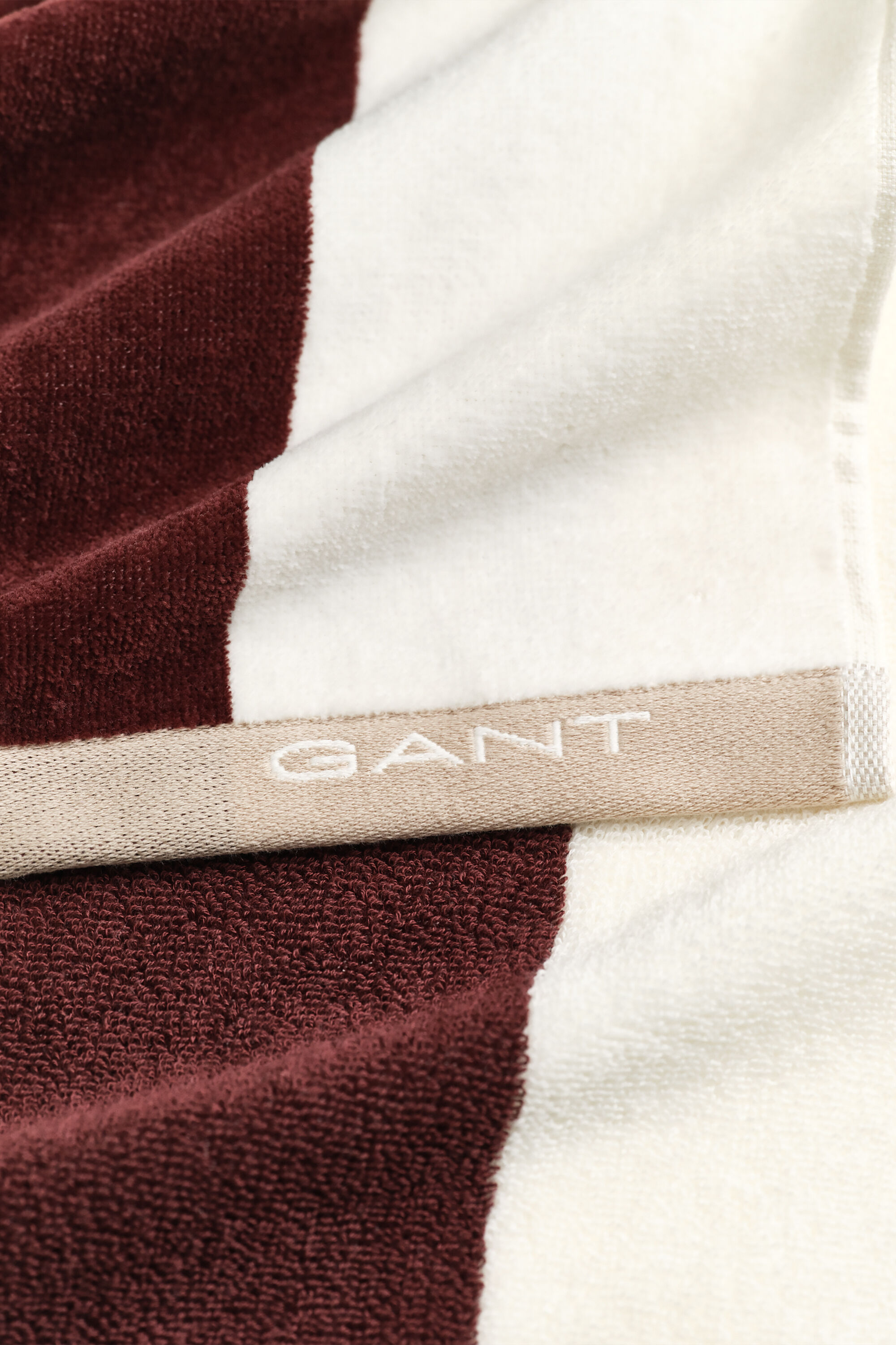 Toalla de playa de rayas gruesas