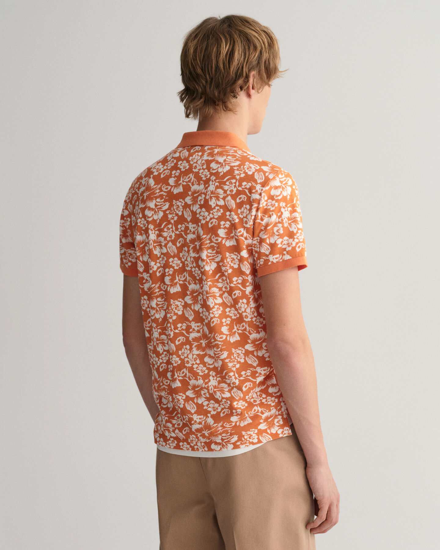 Polo de piqu&eacute; con estampado de flores