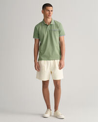 Polo de piqu&eacute; con ribete en tres colores